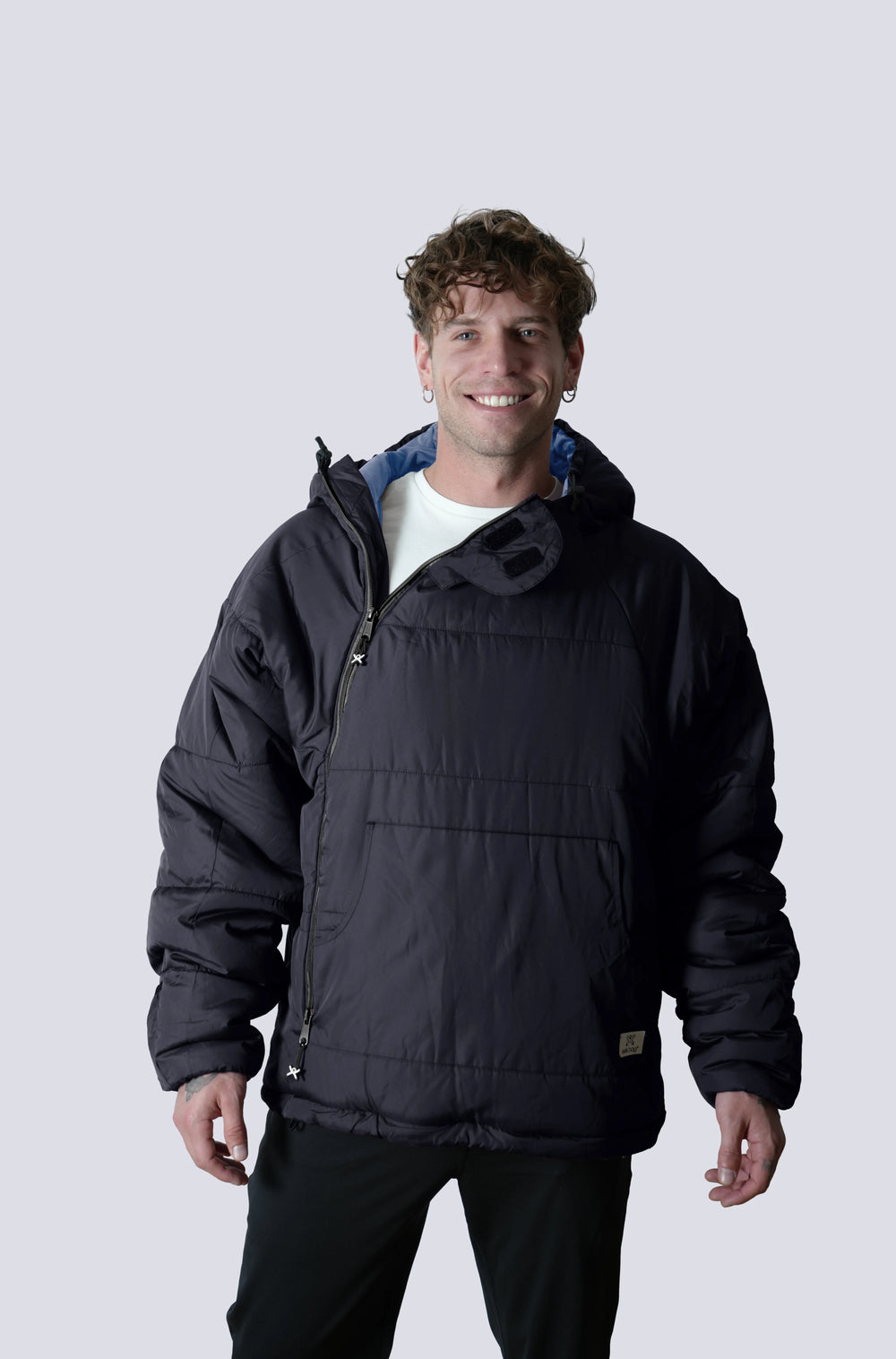 Man wearing the selk'bag wearable sleeping bag