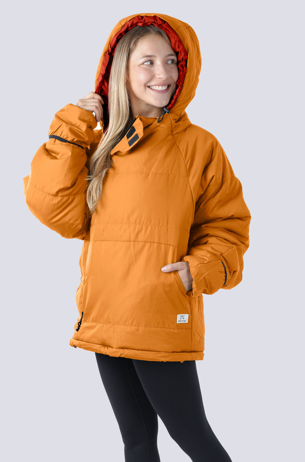 Woman wearing the selk'bag wearable sleeping bag